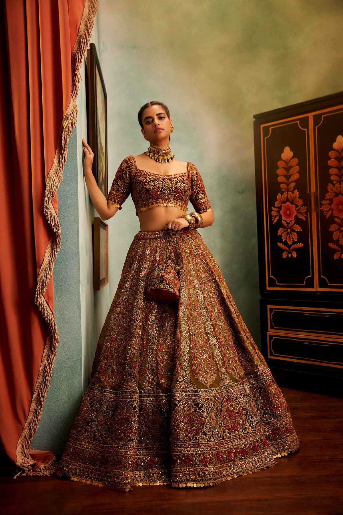 Burnt Orange Tulle Embroidered Lehenga Set Design by Neeta Lulla at  Pernia's Pop Up Shop 2024